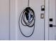Close up of wall mounted Tesla electric vehicle charger at 7445 Mezzanine View Ave, Las Vegas, NV 89178