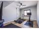 Bright gym area featuring hardwood floors, a ceiling fan and workout equipment at 7445 Mezzanine View Ave, Las Vegas, NV 89178