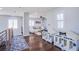 Hallway area with seating area, dog houses and lots of natural light at 7445 Mezzanine View Ave, Las Vegas, NV 89178