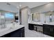 Elegant bathroom featuring dual sinks, sleek cabinetry, and a luxurious walk-in shower for a spa-like retreat at 746 Horizon Canyon Dr, Henderson, NV 89052