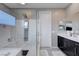 Modern bathroom featuring a spacious glass shower, dual vanities, and contemporary finishes for a spa-like experience at 746 Horizon Canyon Dr, Henderson, NV 89052