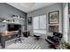 Modern home office with stylish furnishings and ample natural light at 746 Horizon Canyon Dr, Henderson, NV 89052