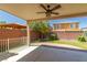 Wonderful backyard with brick landscaping, covered patio, and a swing set at 7652 Silver Baron Rd, Las Vegas, NV 89179
