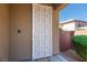 Close-up of the decorative white security door, adding charm and security at 7652 Silver Baron Rd, Las Vegas, NV 89179