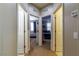 Upstairs hallway leads to multiple bedrooms at 7652 Silver Baron Rd, Las Vegas, NV 89179