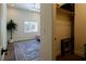 Bedroom with an area rug, ceiling fan, and view into an attached walk-in closet at 7745 Radcliff St, Las Vegas, NV 89123