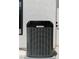 HVAC system located outside the home, situated next to a window and door at 7745 Radcliff St, Las Vegas, NV 89123
