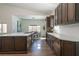 Bright kitchen showcasing custom cabinetry, stainless steel appliances, and sleek countertops, perfect for culinary enthusiasts at 7745 Radcliff St, Las Vegas, NV 89123