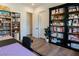 Well-organized office room with bookshelves, desk, and hardwood floors at 7745 Radcliff St, Las Vegas, NV 89123