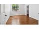 Clean bedroom with wood floors and natural light at 8113 Blue Cascade Ave, Las Vegas, NV 89128