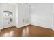 Grand living room boasts high ceilings, beautiful hardwood floors, and natural light at 8113 Blue Cascade Ave, Las Vegas, NV 89128