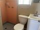 Bathroom featuring a toilet, vanity, and tiled shower at 817 Stewart Ave, Las Vegas, NV 89101