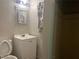 Simple bathroom with white vanity and shower with vintage tile at 817 Stewart Ave, Las Vegas, NV 89101