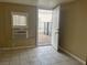 Room with tiled flooring and outdoor access at 817 Stewart Ave, Las Vegas, NV 89101