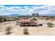 Aerial view showcasing the exterior of a two-story house with desert landscaping at 8335 Rancho Destino Rd, Las Vegas, NV 89123