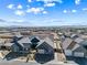 An aerial view shows the layout of this modern gray home with a basketball court and desert landscaping at 8840 Harvest Sunset St, Las Vegas, NV 89113