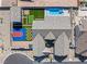 Aerial view of the property showing the pool, putting green, basketball court, and backyard at 8840 Harvest Sunset St, Las Vegas, NV 89113