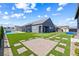 Expansive backyard featuring artificial turf, putting green, basketball court, and a refreshing swimming pool at 8840 Harvest Sunset St, Las Vegas, NV 89113