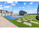 Backyard featuring a basketball court and putting green at 8840 Harvest Sunset St, Las Vegas, NV 89113