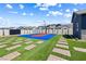 Landscaped backyard featuring a basketball court at 8840 Harvest Sunset St, Las Vegas, NV 89113