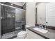 Sleek bathroom featuring a modern shower and stylish vanity at 8840 Harvest Sunset St, Las Vegas, NV 89113