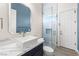 Stylish bathroom with a modern vessel sink, glass shower, and contemporary finishes at 8840 Harvest Sunset St, Las Vegas, NV 89113