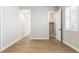 Bedroom featuring tiled floors, white trim, and a view of a closet at 8840 Harvest Sunset St, Las Vegas, NV 89113
