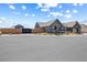 This well-maintained gray home sits behind a brick privacy wall and low maintenance desert landscaping at 8840 Harvest Sunset St, Las Vegas, NV 89113