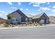 This gray single-Gathering home with low-maintenance landscaping is located on a paved street at 8840 Harvest Sunset St, Las Vegas, NV 89113