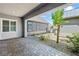 A paved walkway leads to the front entrance, enhanced by stone landscaping and a covered porch at 8840 Harvest Sunset St, Las Vegas, NV 89113