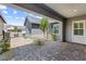 A paved walkway leads to the front entrance, enhanced by stone landscaping and a covered porch at 8840 Harvest Sunset St, Las Vegas, NV 89113