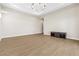 Open living space features wood floors and modern lighting at 8840 Harvest Sunset St, Las Vegas, NV 89113