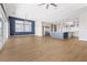 Modern open floorplan with a ceiling fan and ample space for entertaining at 8840 Harvest Sunset St, Las Vegas, NV 89113