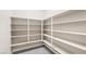 Walk-in pantry featuring ample shelving for organized storage at 8840 Harvest Sunset St, Las Vegas, NV 89113