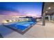 Backyard featuring a refreshing pool, spa, and covered patio for relaxation and entertainment at 8840 Harvest Sunset St, Las Vegas, NV 89113