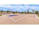 Outdoor basketball court with mountain views and shaded seating areas at 928 Riverlawn Pl, Las Vegas, NV 89138