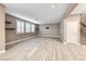 Unstaged Living room with wood flooring and plantation shutters at 928 Riverlawn Pl, Las Vegas, NV 89138