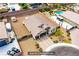 Aerial view of backyard with covered patio, detached shed and low maintenance landscaping at 10470 Irish Cliffs Ct, Las Vegas, NV 89149