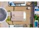 Drone eye view of a low maintenance backyard featuring a covered patio and a detached shed at 10470 Irish Cliffs Ct, Las Vegas, NV 89149