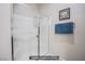 Contemporary bathroom with a glass-enclosed shower and modern fixtures at 10470 Irish Cliffs Ct, Las Vegas, NV 89149