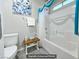 Bright bathroom showcasing a tub with shower, toilet, and stylish decor at 10470 Irish Cliffs Ct, Las Vegas, NV 89149