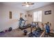 Bedroom featuring exercise equipment, natural light, and neutral walls at 10470 Irish Cliffs Ct, Las Vegas, NV 89149