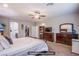 The main bedroom boasts generous space and serene ambiance, complete with a ceiling fan at 10470 Irish Cliffs Ct, Las Vegas, NV 89149
