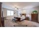 Spacious main bedroom with ample natural light and room for a sitting area at 10470 Irish Cliffs Ct, Las Vegas, NV 89149