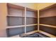 Bright and spacious walk-in pantry featuring ample shelving for organized storage at 10470 Irish Cliffs Ct, Las Vegas, NV 89149