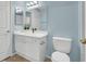 Clean and simple bathroom with a toilet and white sink at 10553 Pine Glen Ave # 101, Las Vegas, NV 89144