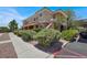 Attractive two-story condo with lush landscaping, covered parking, and a bright, open design at 10553 Pine Glen Ave # 101, Las Vegas, NV 89144