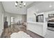 Open-concept living space with a sleek kitchen, comfortable seating, and modern design at 10553 Pine Glen Ave # 101, Las Vegas, NV 89144