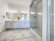 Modern bathroom featuring a glass shower and double vanity at 146 Cabo Cruces Dr, Henderson, NV 89011