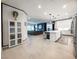 Open concept living area with an inviting island, modern appliances, and plenty of space for entertaining at 146 Cabo Cruces Dr, Henderson, NV 89011